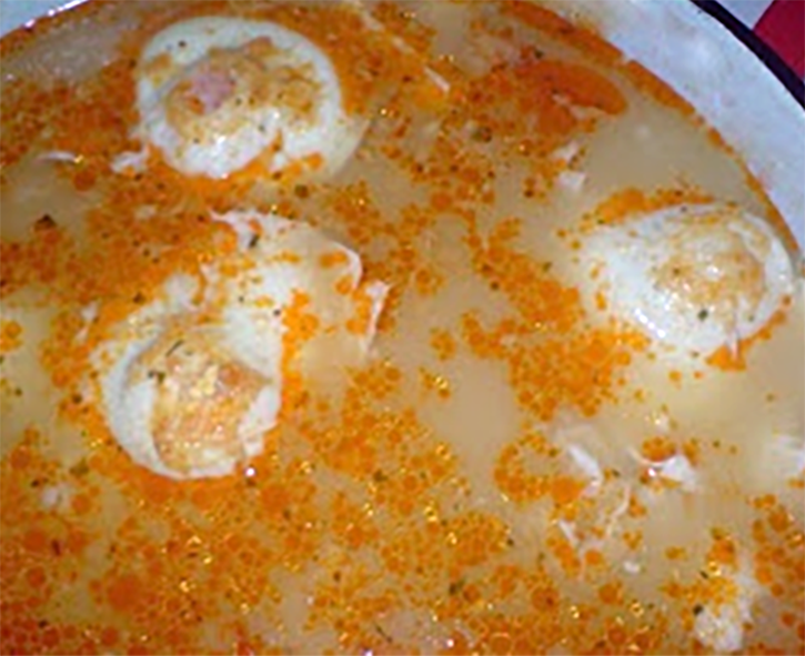 flour soup served topped with poached eggs