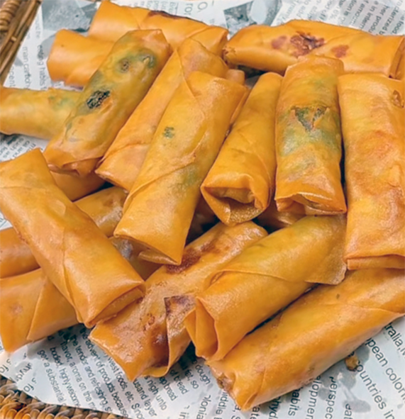 Deep fried spring rolls on a tray