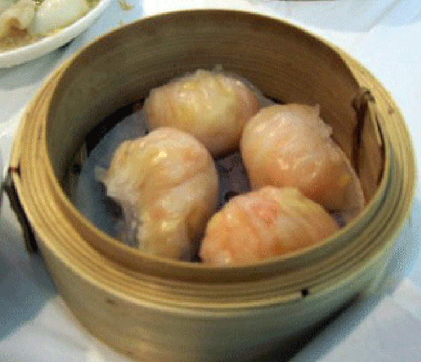 Dim sum served in a bamboo steamer