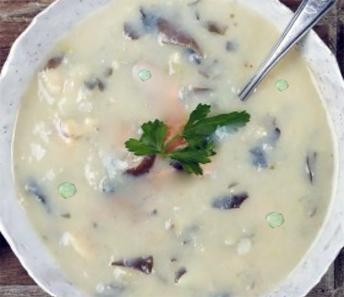 dulse chowder with mallow fruit pods or cheeses in a white bowl
