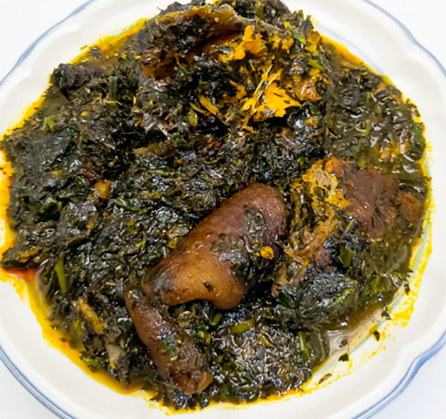 editan soup presented on a white plate