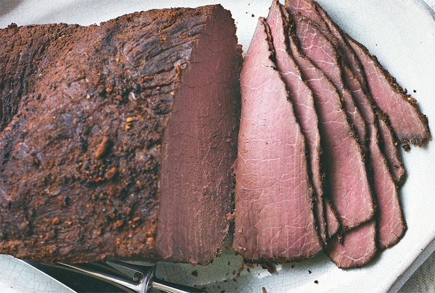 boiled spiced beef sliced thinly on a plate