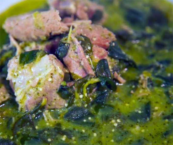 salt and pepper squid rings served on a plate and accompanied by a dressed salad
