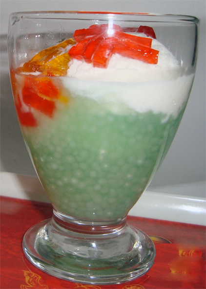 faluda layered dessert presented in a dessert glass