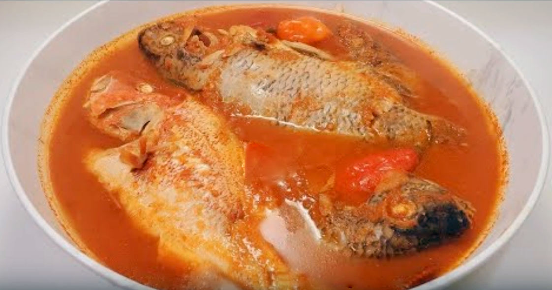 three whole fish cooked in Gambian-style pepper soup served in a bowl