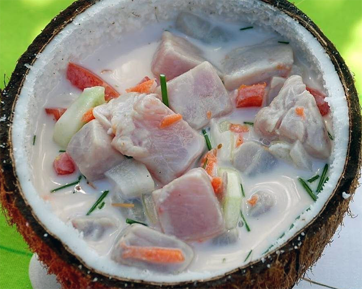 Gambier-style raw fish salad served in a coconut shell