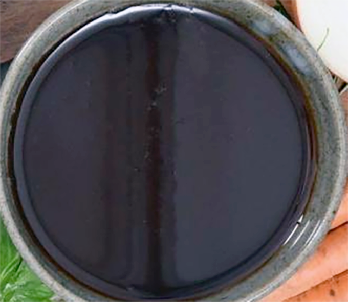 dark game meat extract in a small bowl