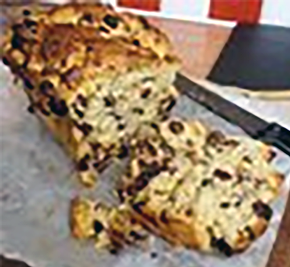 Guernsey gache with a slice cut off to reveal the centre