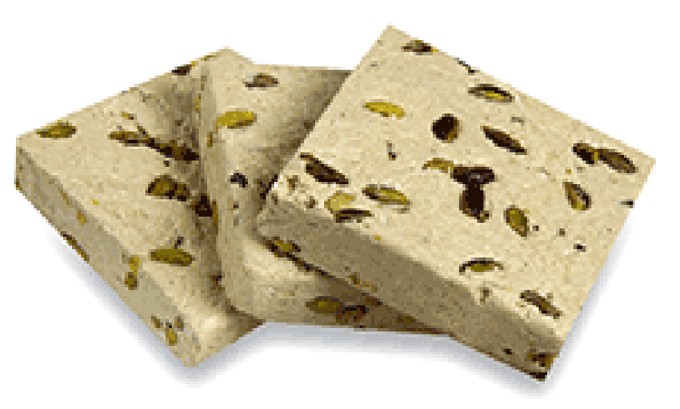 Tahini-based halva with pistachios and raisins, shown sliced