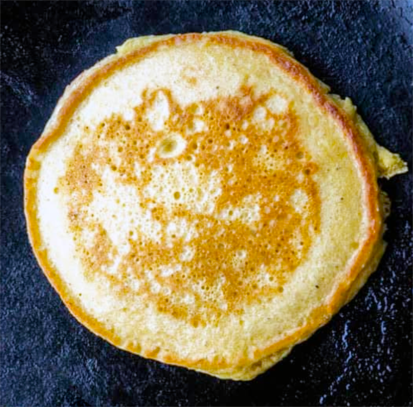 hazel pollen pancake presented on a blue slate