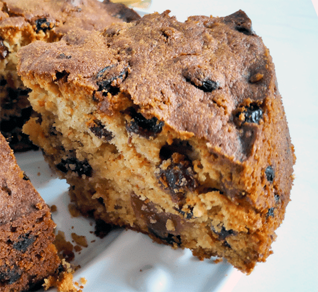 Wedge of un-iced hogmanay whisky cake taken out of the main cake