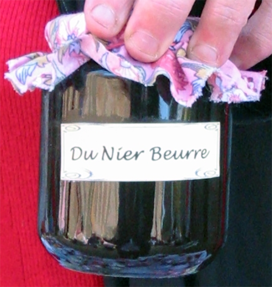 black butter in a jar