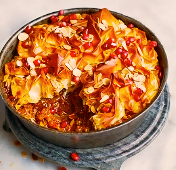 lamb tagine pie with filo pastry topping presented in a steel pie dish