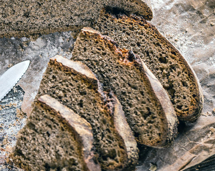 slices of rye bread on a chopping board