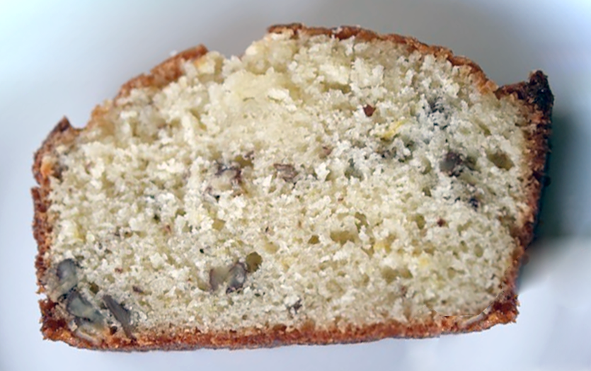 slice of lemon nut loaf on a plate