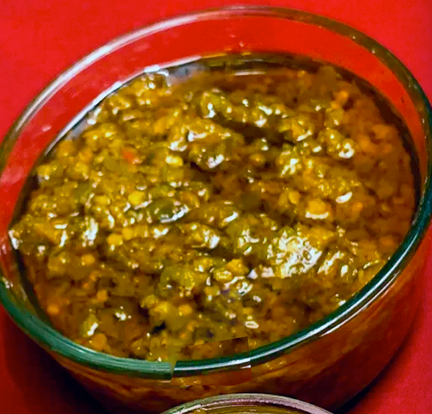 Liberian-style pepper (chilli) sauce served in a glass bowl