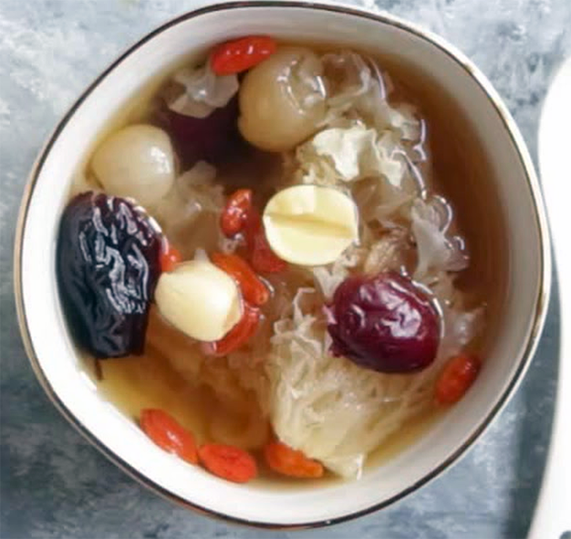 Snow fungus dessert soup served in a white bowl