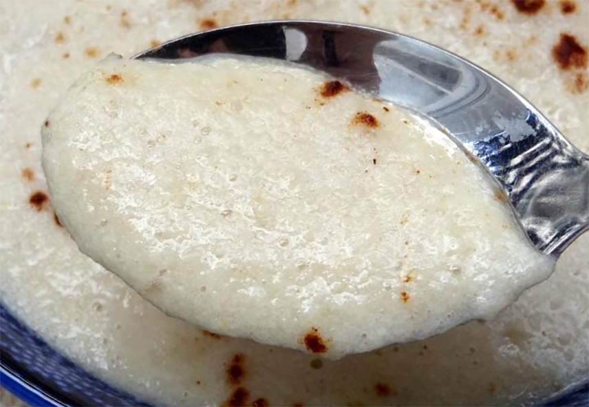 Malawi banana soup on a spoon
