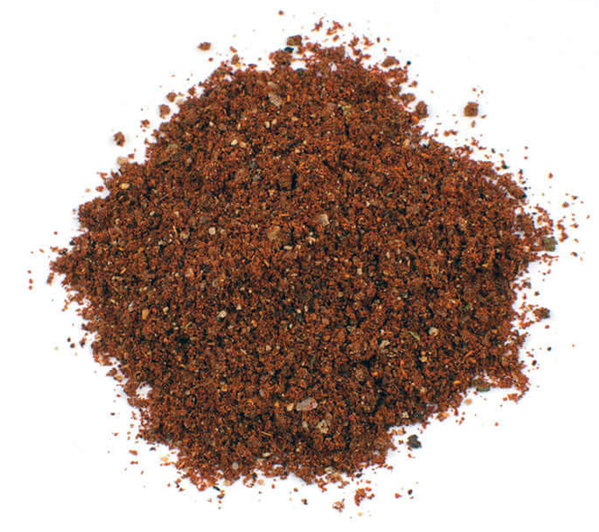 mole seasoning spice blend against a white background