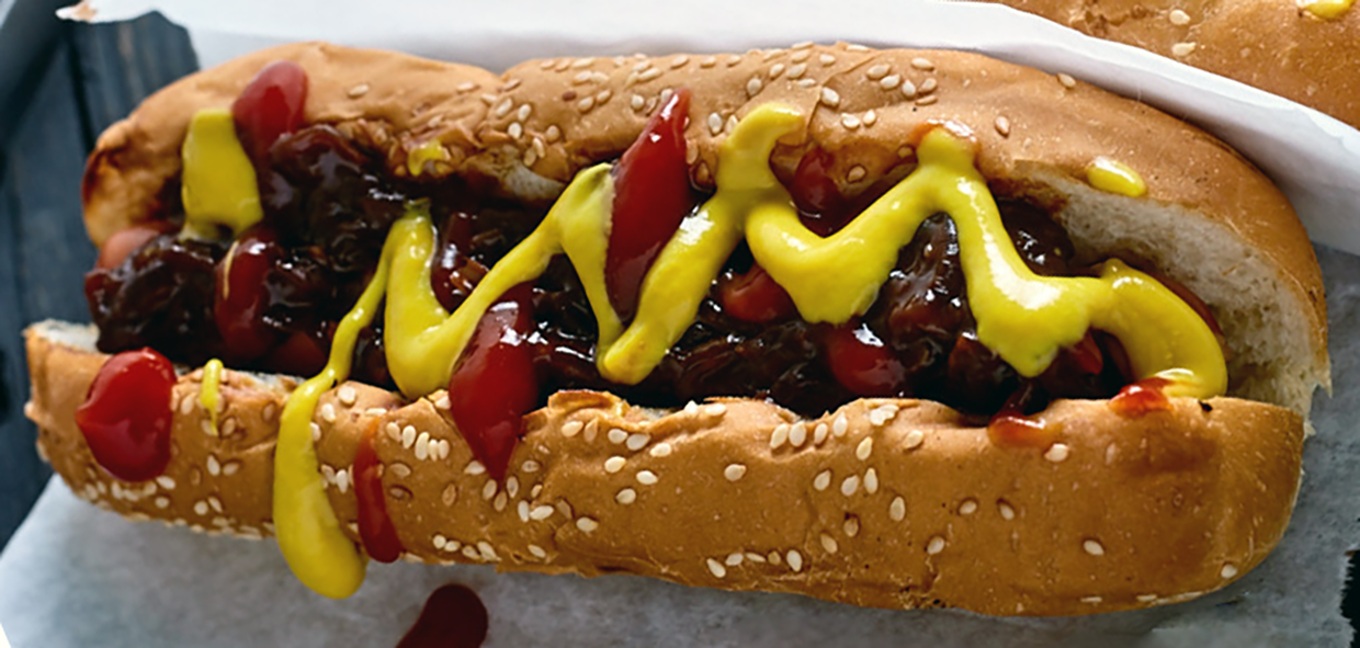 New York style hot dog on serving paper