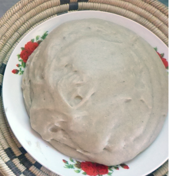 oshifima, namibian stiff maize and millet porridge on a plate