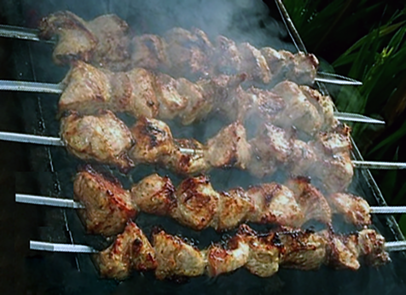 Ossetian fizonag kebabs on a barbecue