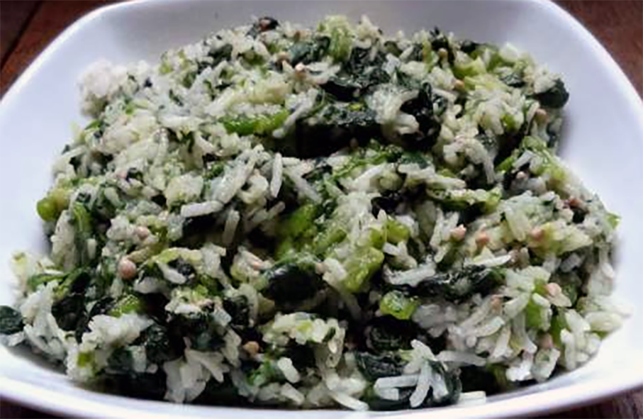 rice, okra and spinach stew drained and served in a bowl
