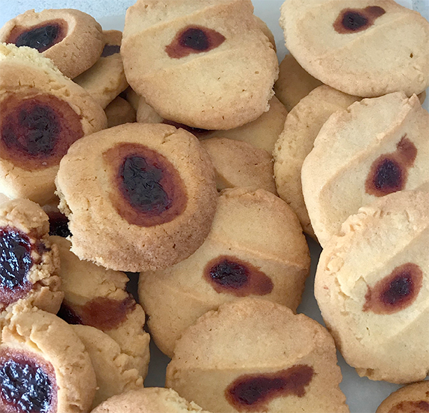 raspberry drop biscuits piled on a plate