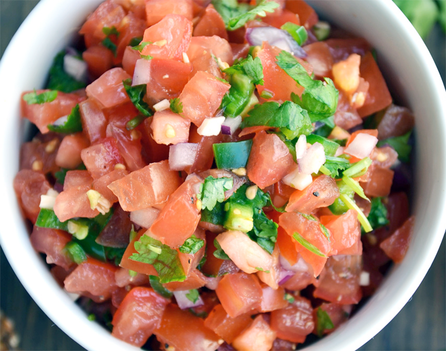 raw salsa of tomatoes and onions with coriander