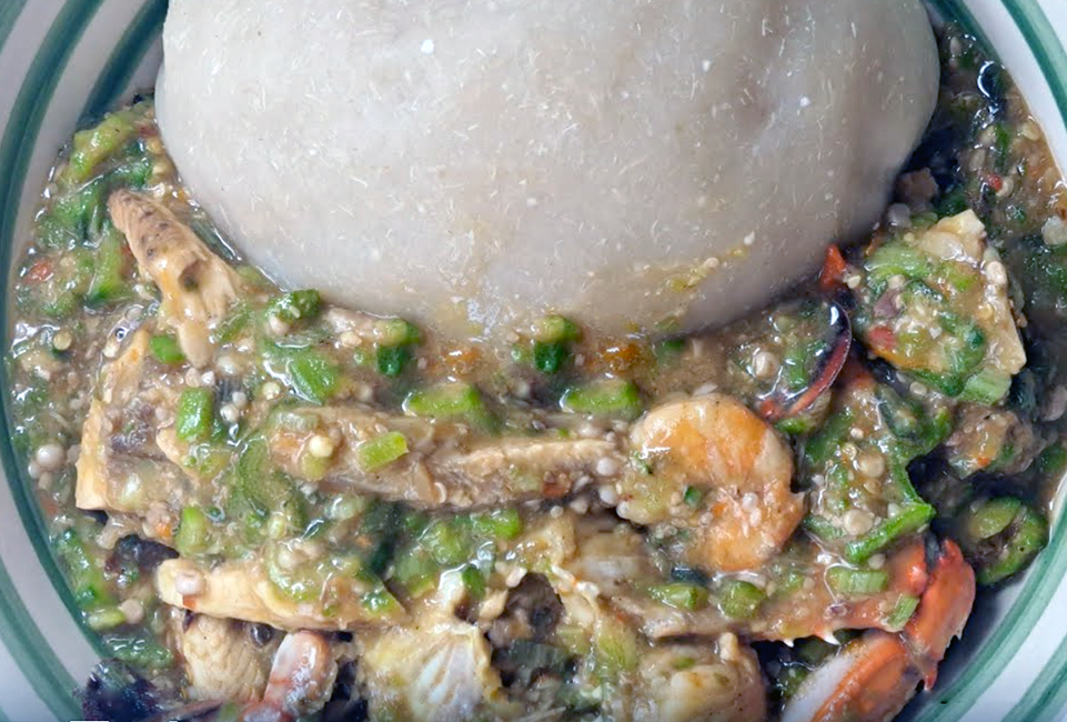 sierra leonean white okra draw soup served in a dish with fufu