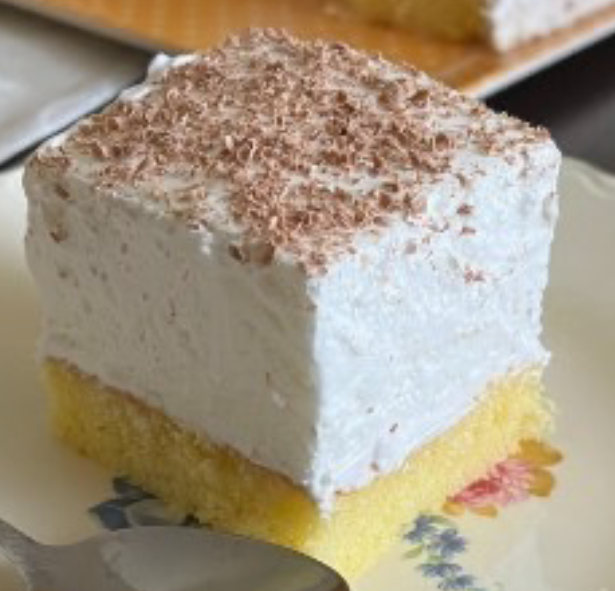 square of sampita, bosnian meringue cake presented on a plate