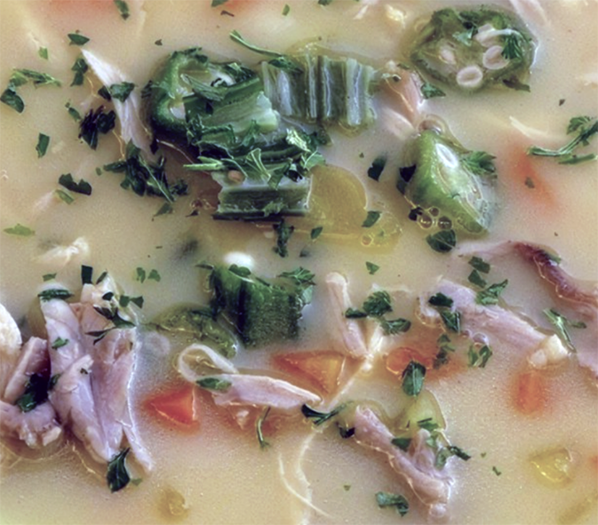 Sarajevo veal and okra soup served garnished with fresh okra