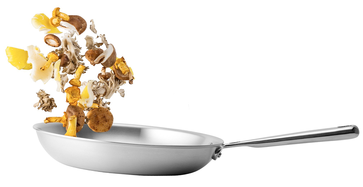 Sauter, cooking food in a deep frying pan with tossing