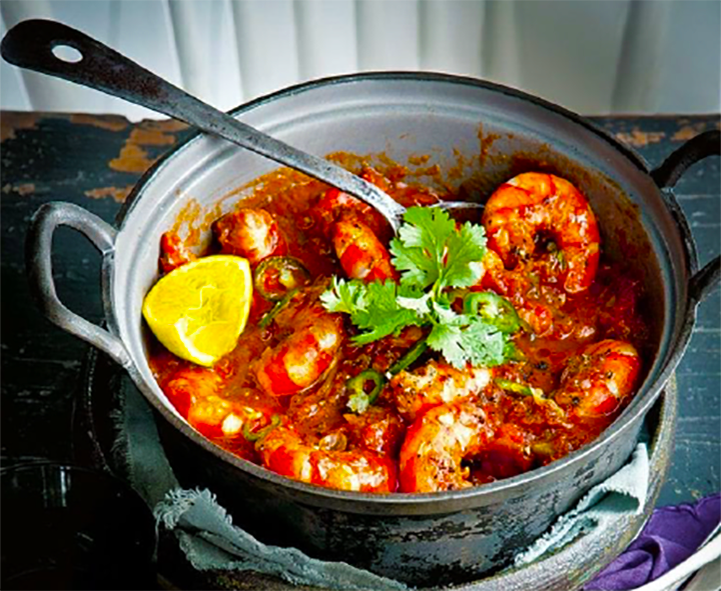 smoky prawns in a tomato sauce with coriander