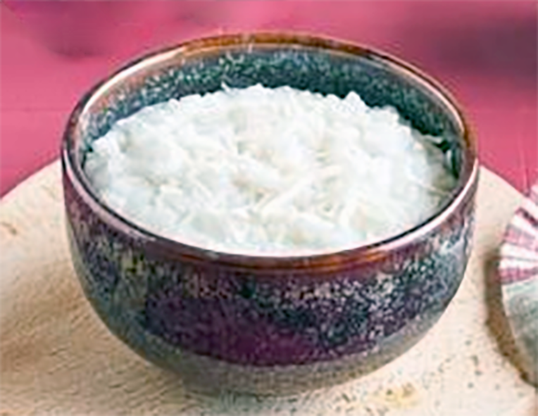 sombi rice pudding in condensed milk with milk curds served in a decorated earthenware bowl