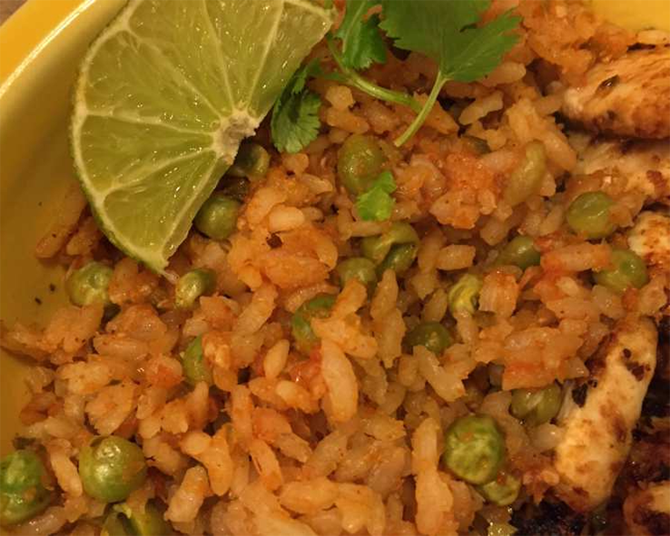 Mexican sopa seca rice served with a wedge of lime