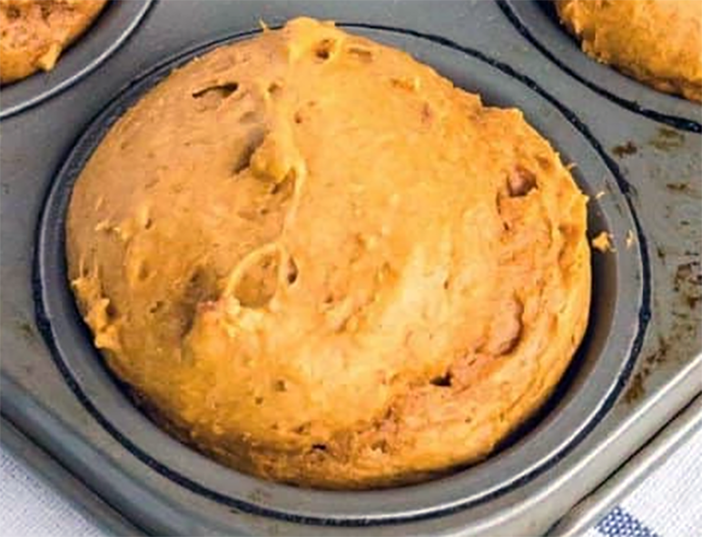 Spicy Pumpkin Quick Mix Muffin in a muffin tin