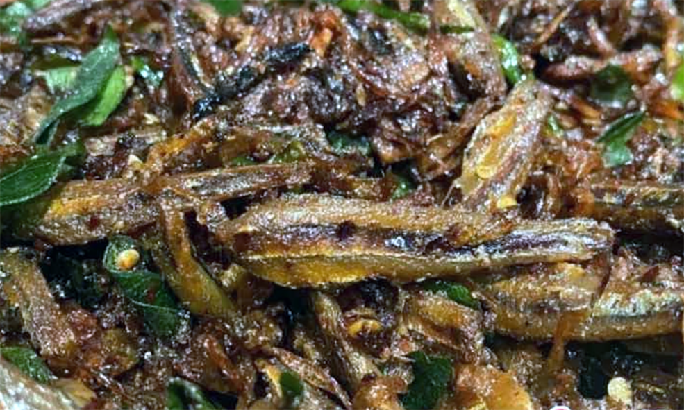 sprats moju pickle served on a plate