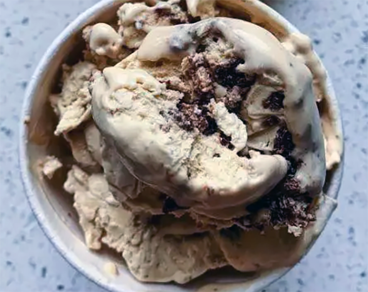 scoops of tahini and halva ice cream in a bowl