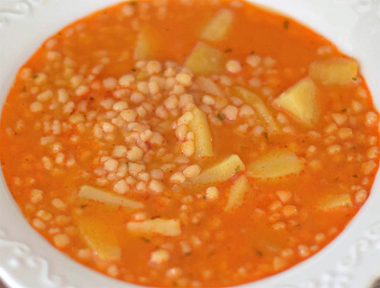 potato and pasta pellet soup served in a soup bowl