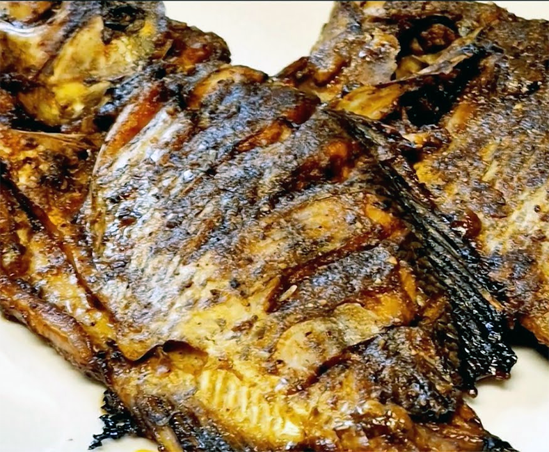 spiced and oven-roasted tilapia on a plate