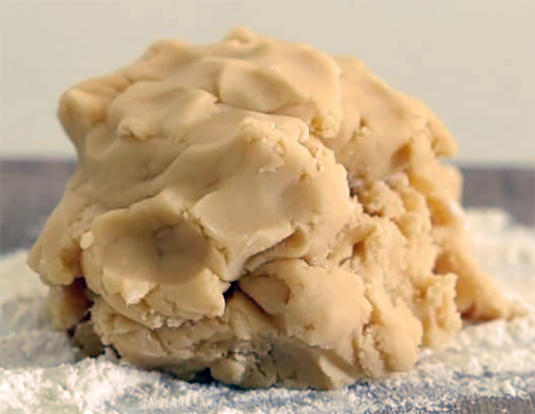 Elizabethan saffron shortcrust pastry on a floured board