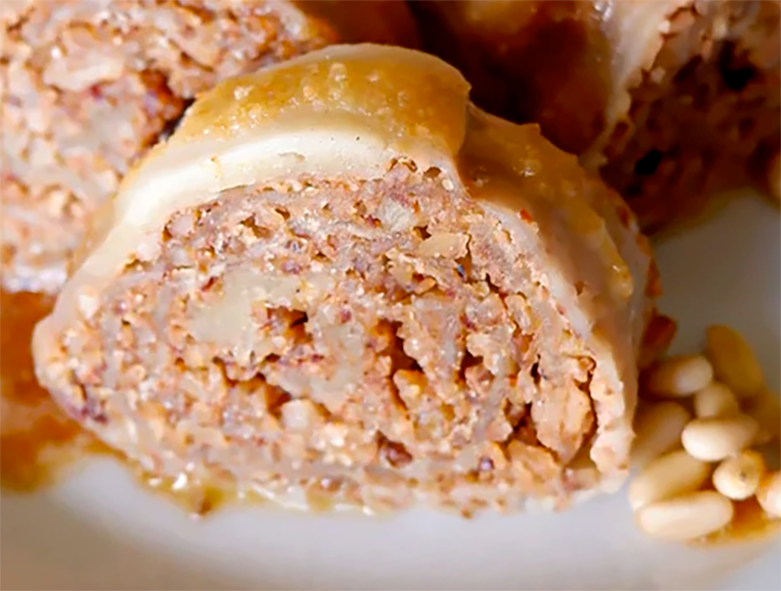 trieste-style struklji with caramel sauce and toasted pine nuts