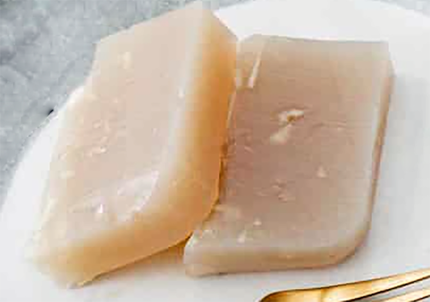 two slices of water chestnut cake on a plate