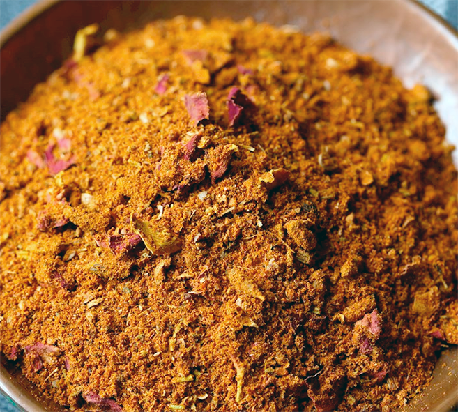 West Africa seasoning blend in a wooden bowl