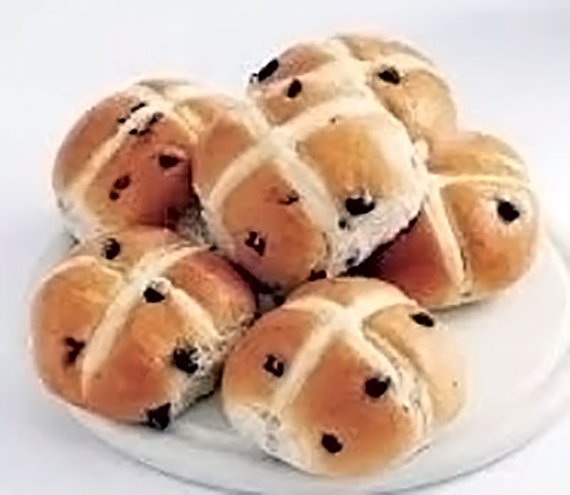 Hot Cross Buns: A classic British recipe for the tea-time treat of fruited yeasted buns decorated with a flour cross